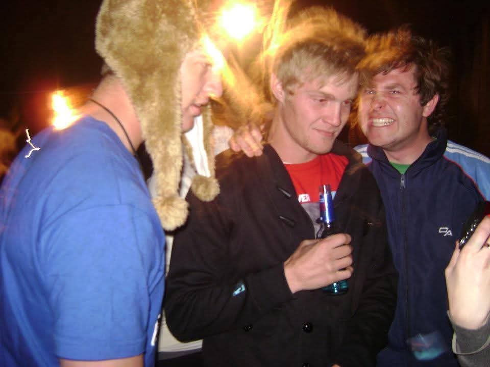 Angelo and friends laughing together on a night out